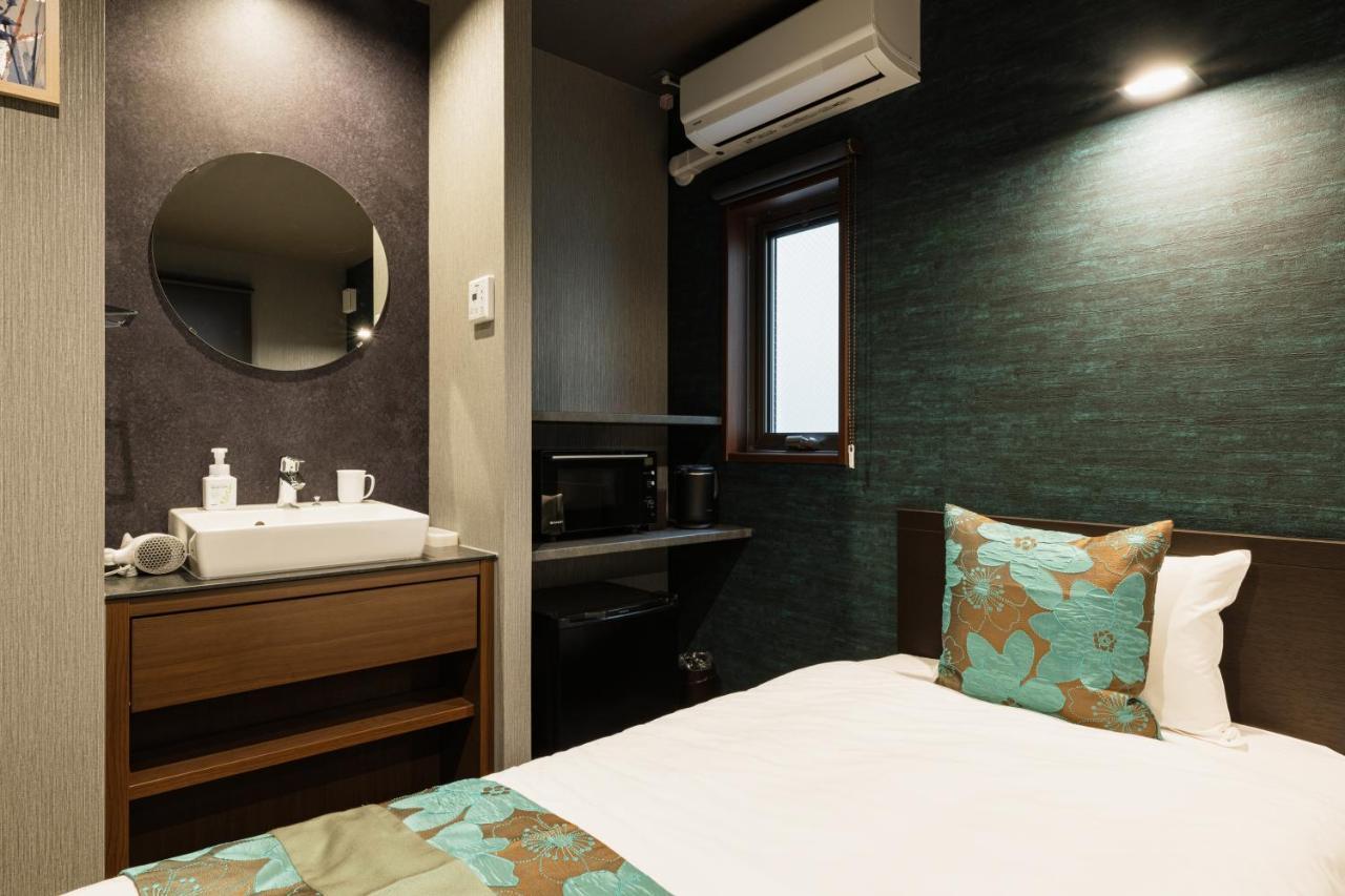 Grand Base Haruyoshi Lejlighedshotel Fukuoka  Eksteriør billede